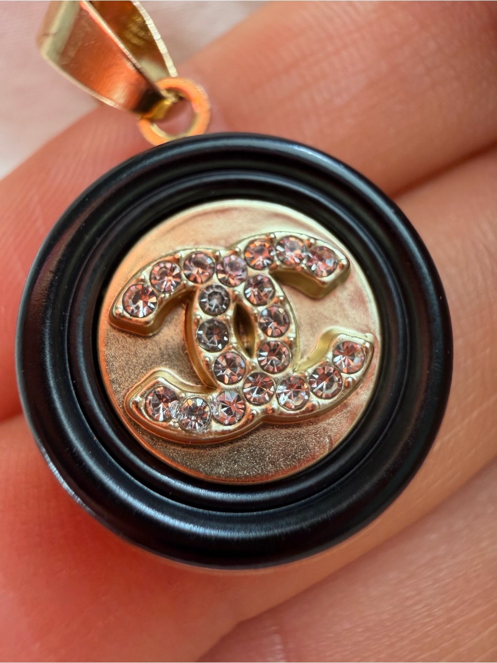 CHANEL Black and Gold Crystal CC Round Pendant Necklace